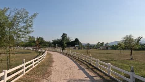 progression through a farm's gated entrance to its interior