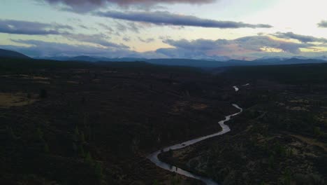 hyper-lapse of meandering o'donnel river surrounded by white spruce forest, canada