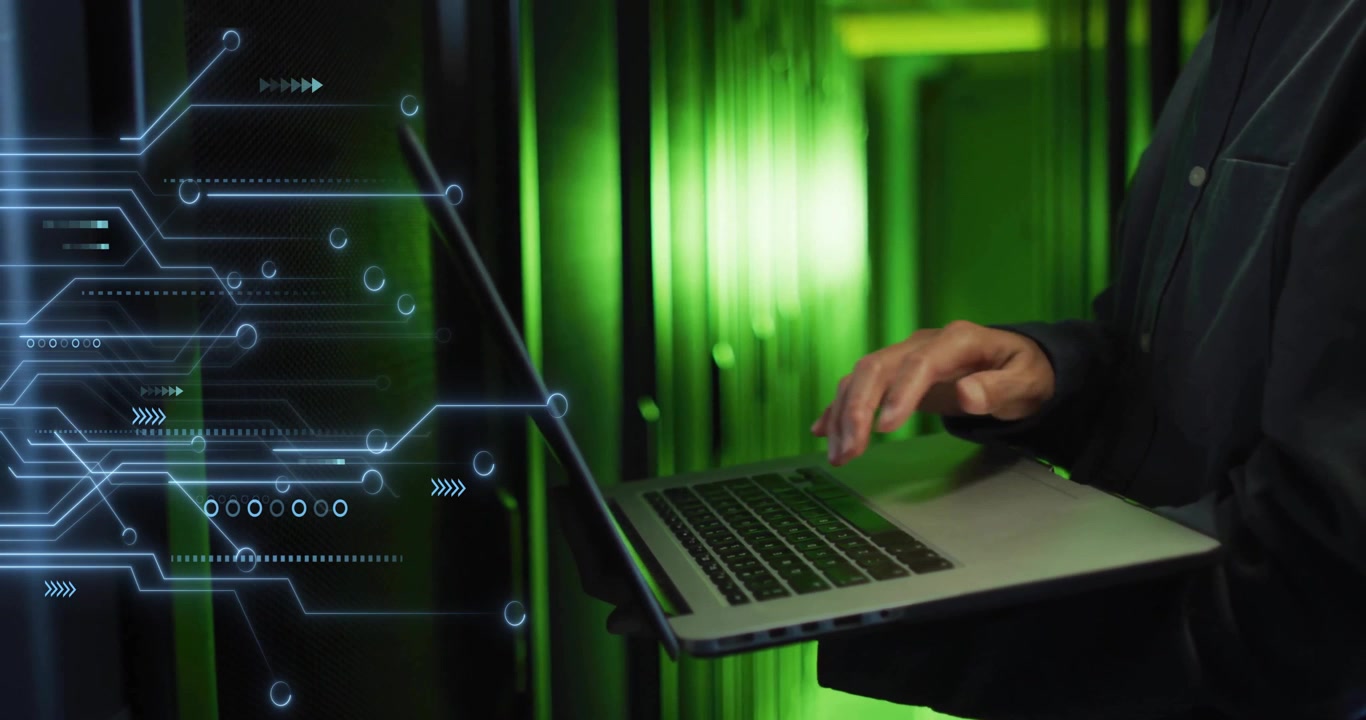 Animation of motherboard over midsect5ion of male it tech using laptop in server room