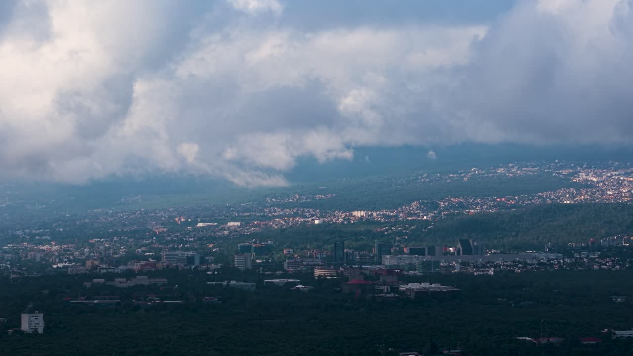 Drone shots capturing low cloud cover in western Mexico City