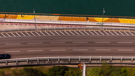 timelapse looking down onto a busy highway in hong kong central