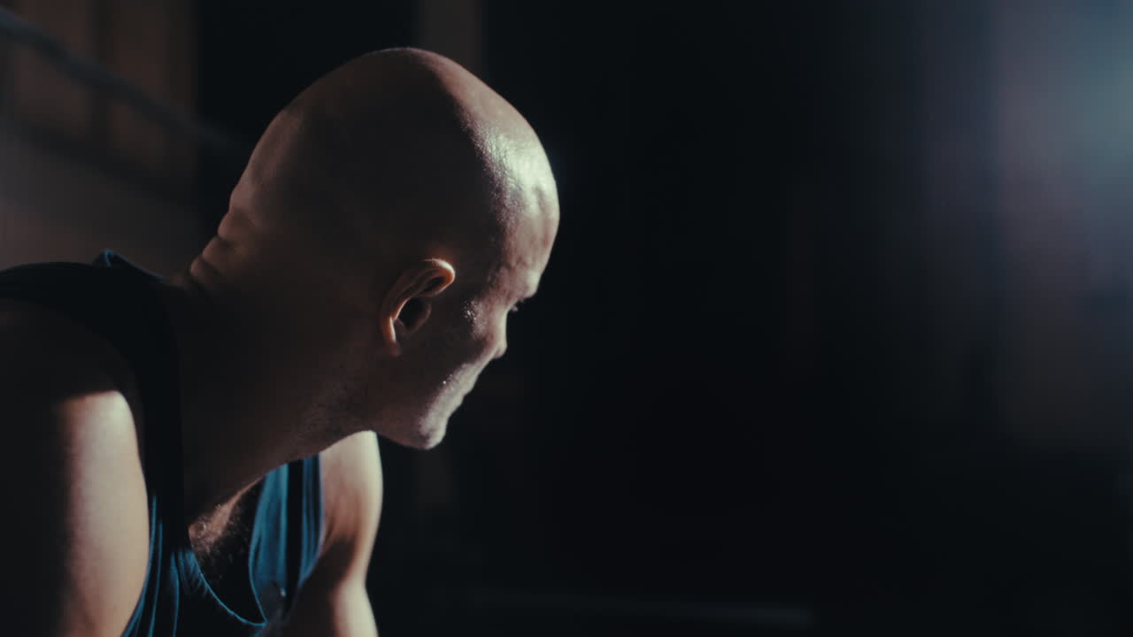 Bald Man in Profile View, Concentrated