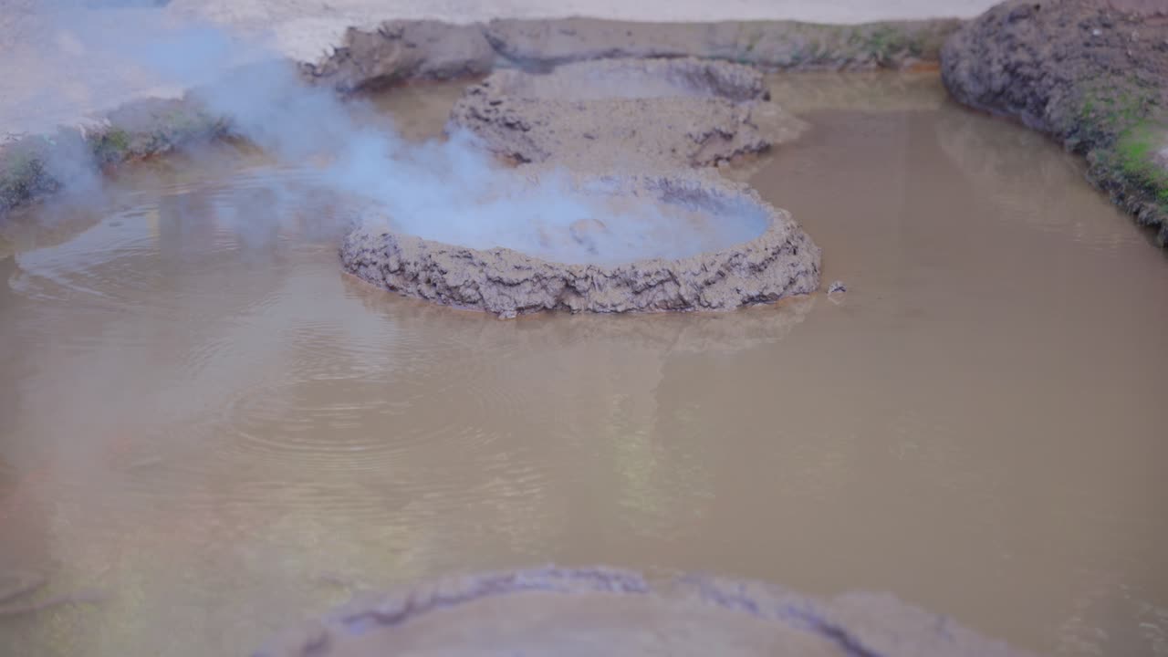 Caustic Geothermal Pool Boils Away, Mud Pool in Volcanic Region