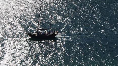 spectral high contrast: tourist pirate boat goes on sightseeing tour