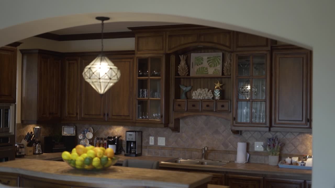 kitchen with rustic wooden cabinet with hanging chandelier