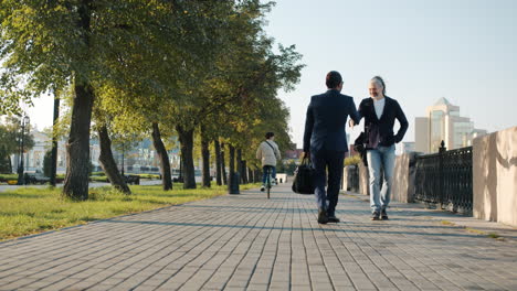 people in a city park on a sunny day