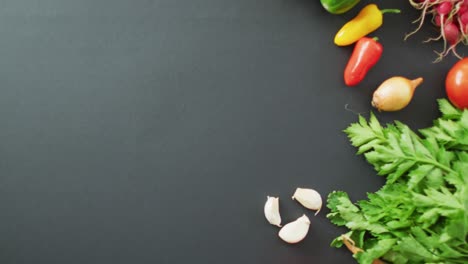 video of fresh vegetables with copy space over grey background