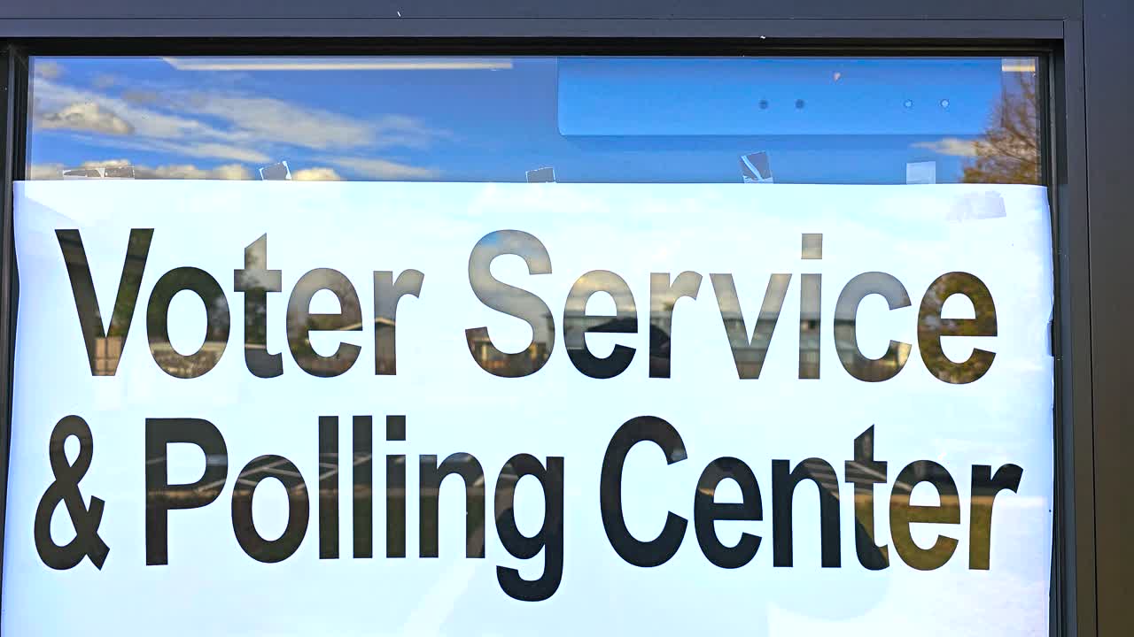 Close-up of a “Voting Service Polling Center” sign, representing voter rights, democracy, and the importance of in-person participation and ballot access during elections