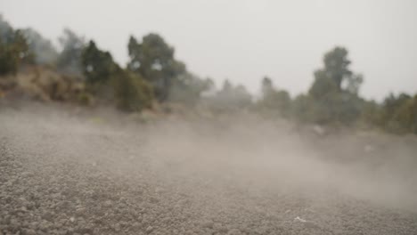 rocks rolling on the dusty steep hills of acatenango volcano