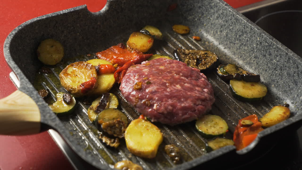 Cooking burger with vegetables