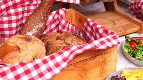 assorted breads in a wooden crate