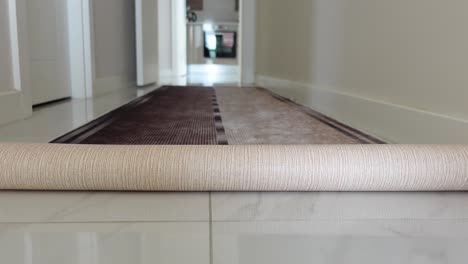 rolled up carpet in a hallway