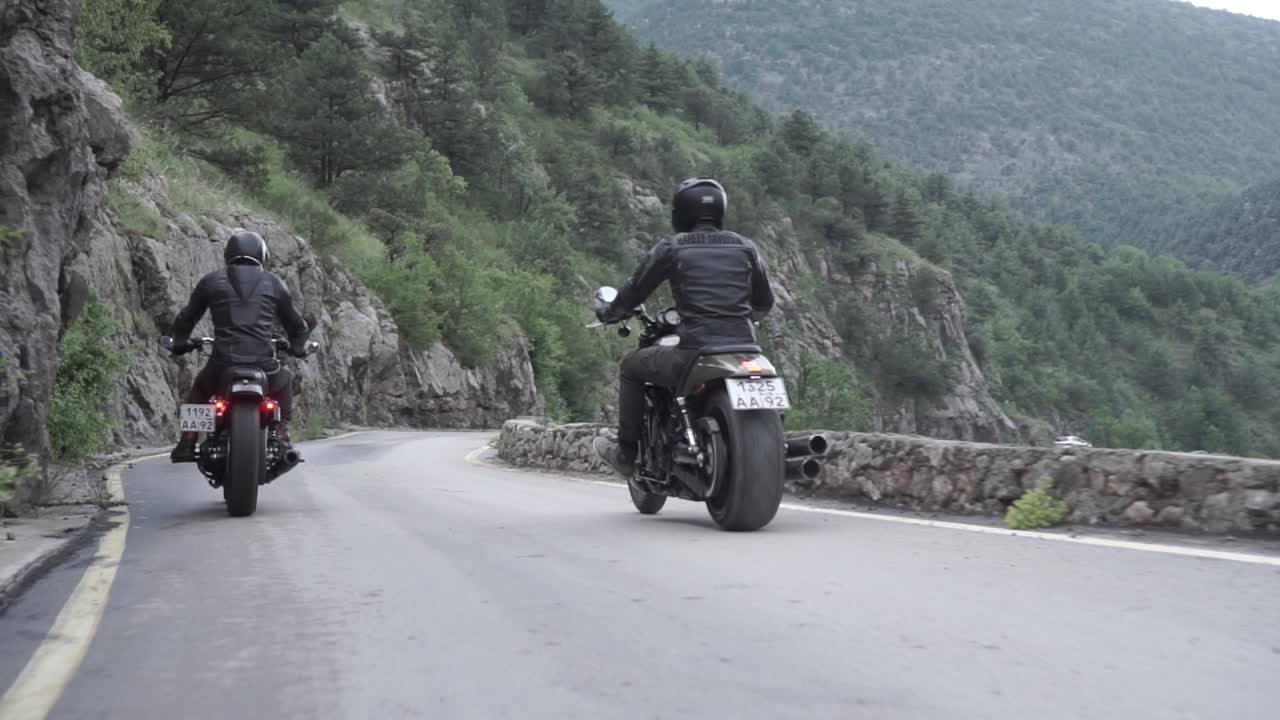 Motorcyclists on a Mountain Road Trip