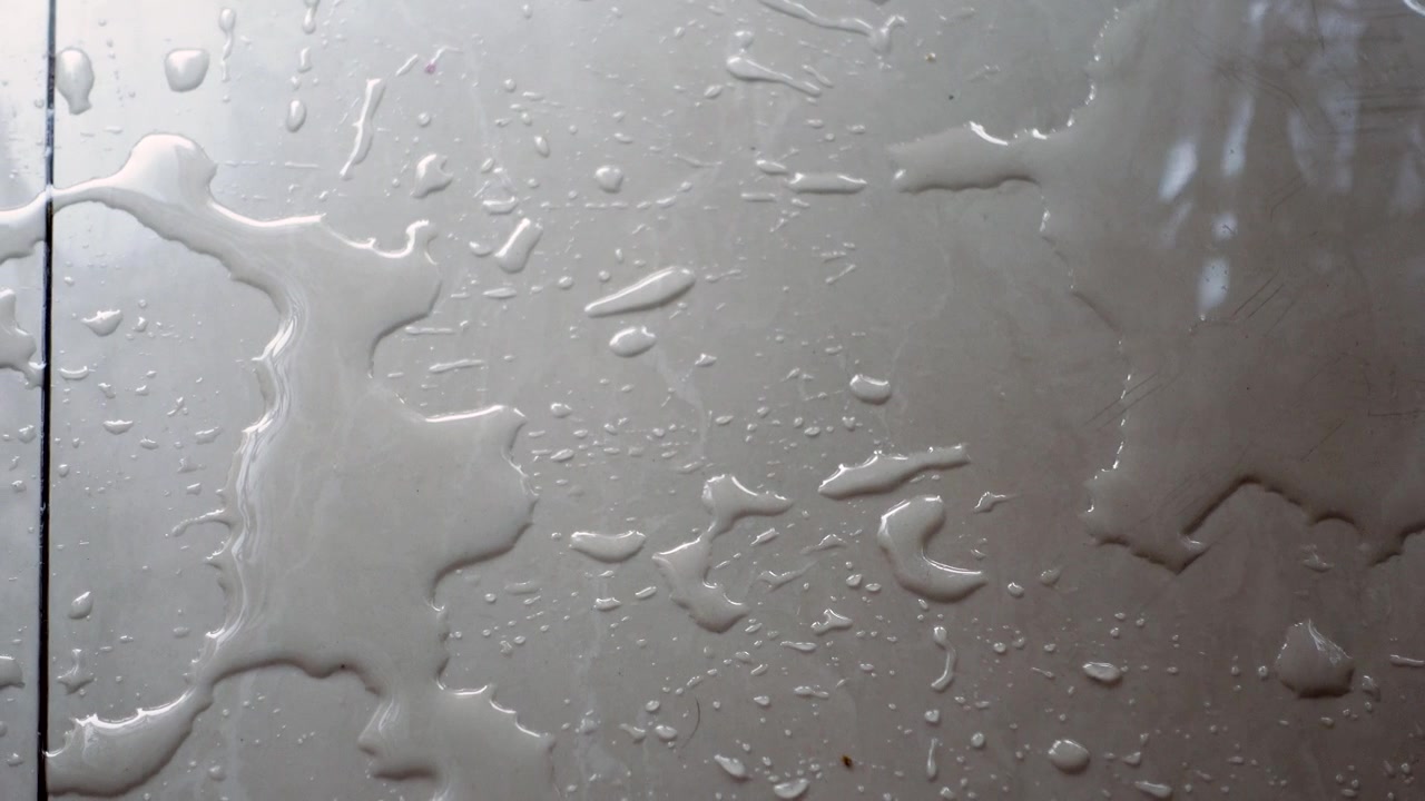 Water Spilled on Tiled Floor