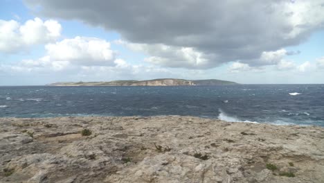 roaring mediterranean sea on winter near coral lagoon in malta