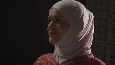 studio portrait of muslim woman wearing hijab against plain background 4