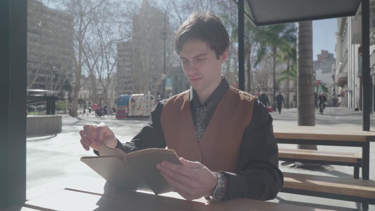 Young business man talking on the phone and smile