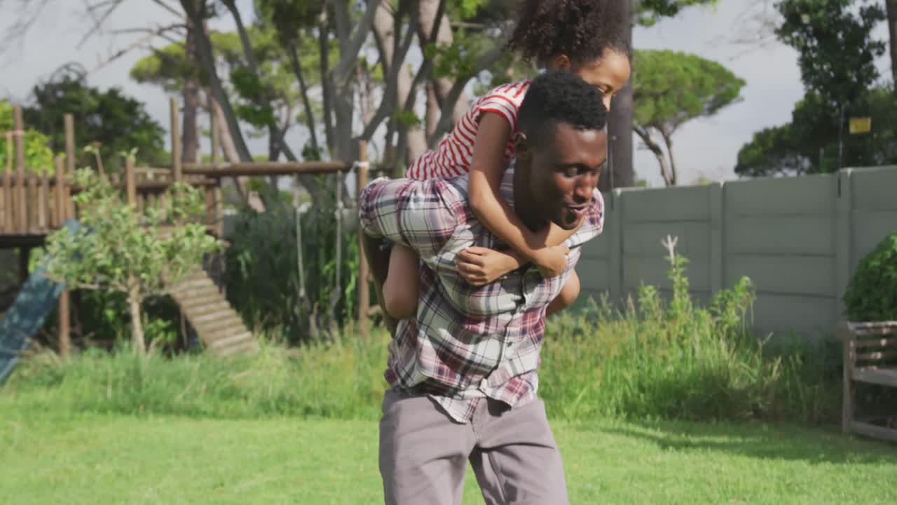 African american father and daughter spending time together