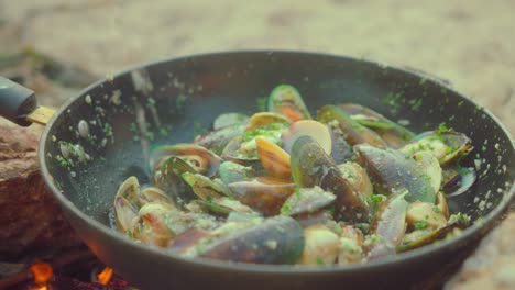 delicious seafood cooked over a campfire