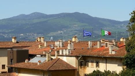 EU-and-Italian-Flag-Flying-in-Florence