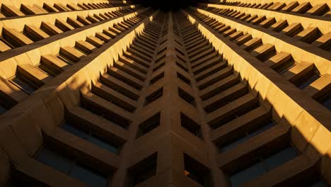 a stunning captivating look upward at the geometric patterns of a modern architectural marvel bathed in golden light, highlighting its unique facade and design