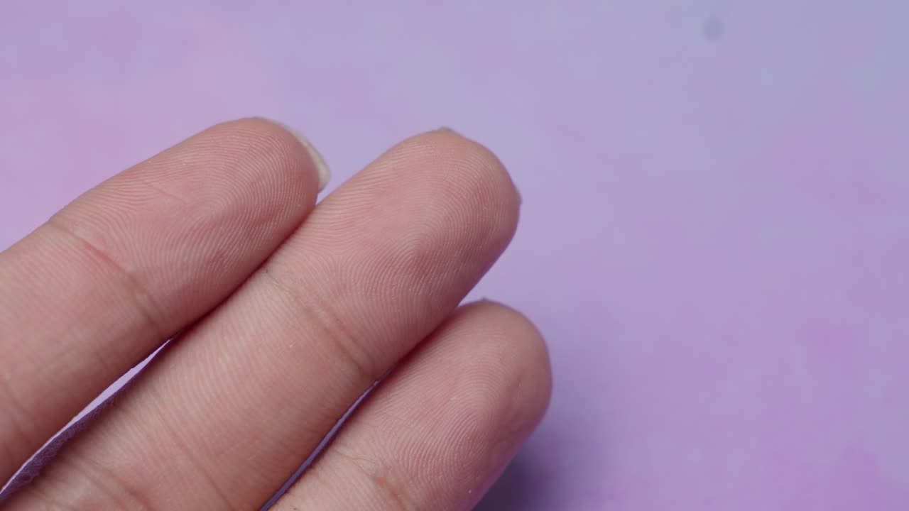 Cleaning Fingers with a Cotton Pad