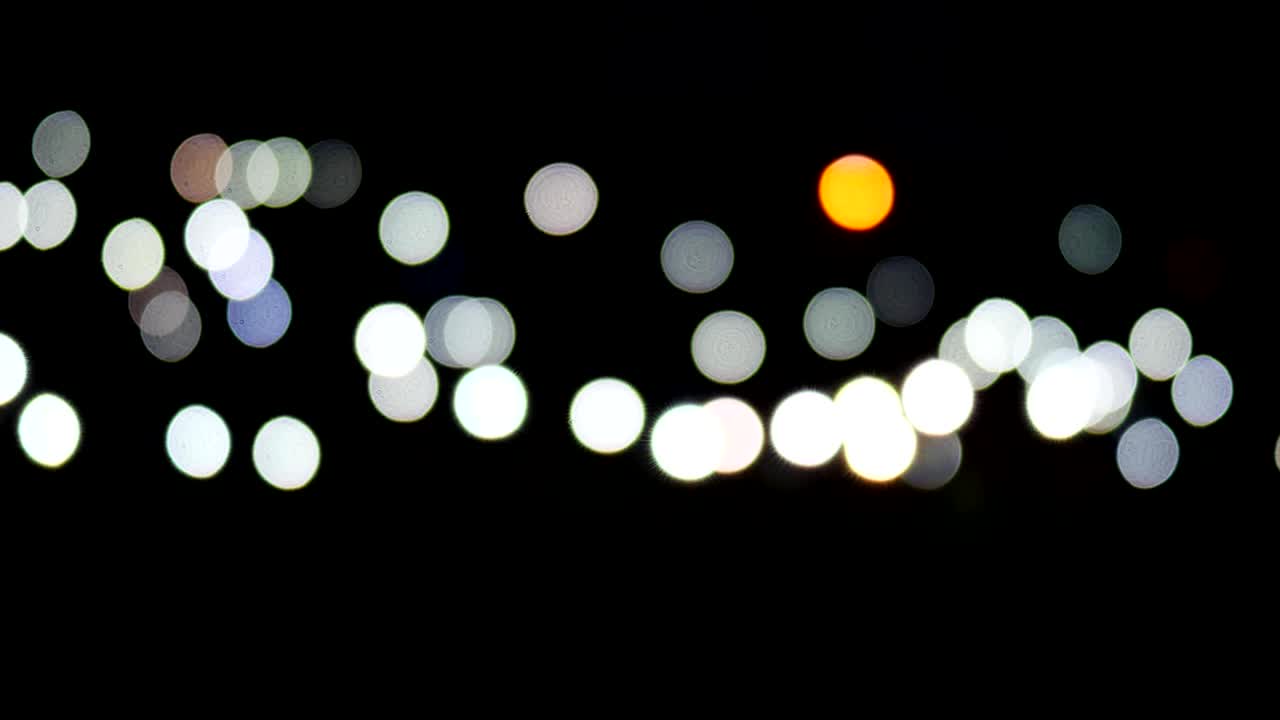 background for inscription, colored dots on dark fond, many colored points on screen, multi blurry dot