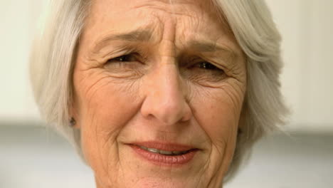 old woman seeming sad