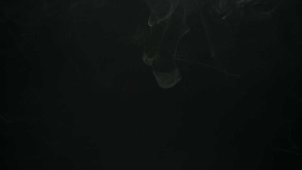 Ethereal White Smoke Rising on a Black Background