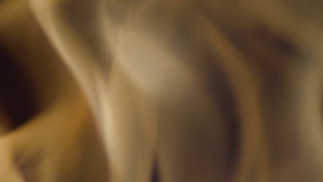 Slow-motion-shot-of-flames-and-embers-in-a-fireplace