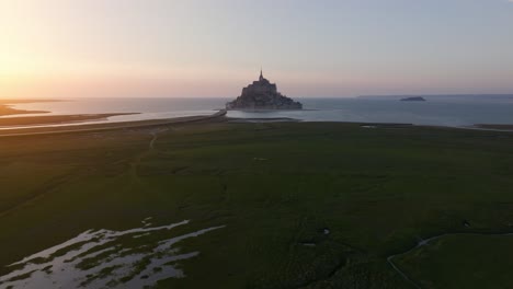 flying towards mont st michel during sunset