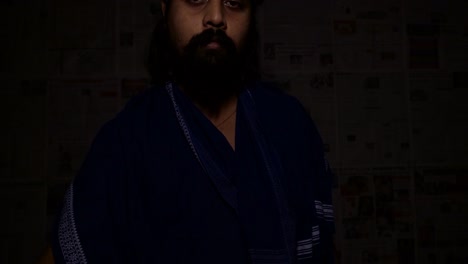 indian monk with mashal(fire stick torch)