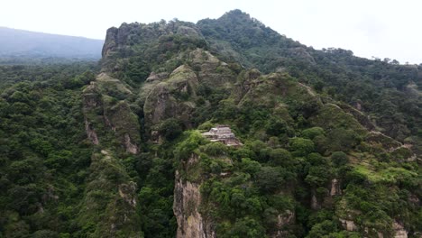 Revealing drone shot of El Tepozteco in Morelos, Mexico