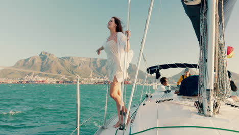 Travel,-freedom-and-journey-with-woman-on-yacht