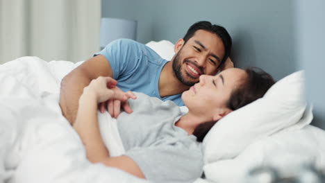 Couple,-laughing-and-love-bond-in-bedroom