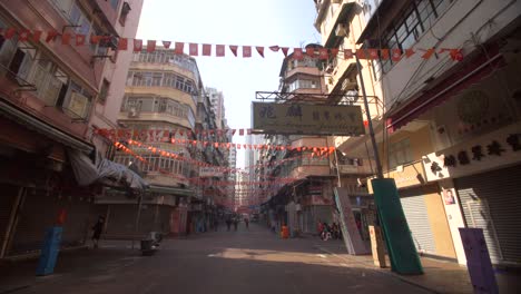 orange bunting over hong kong street