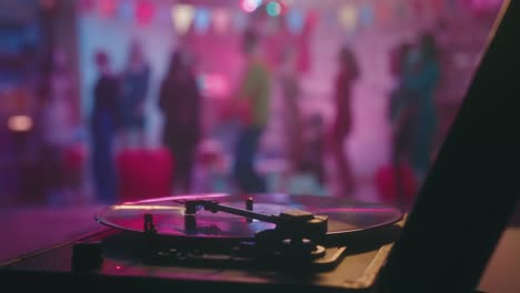 party at night with record player