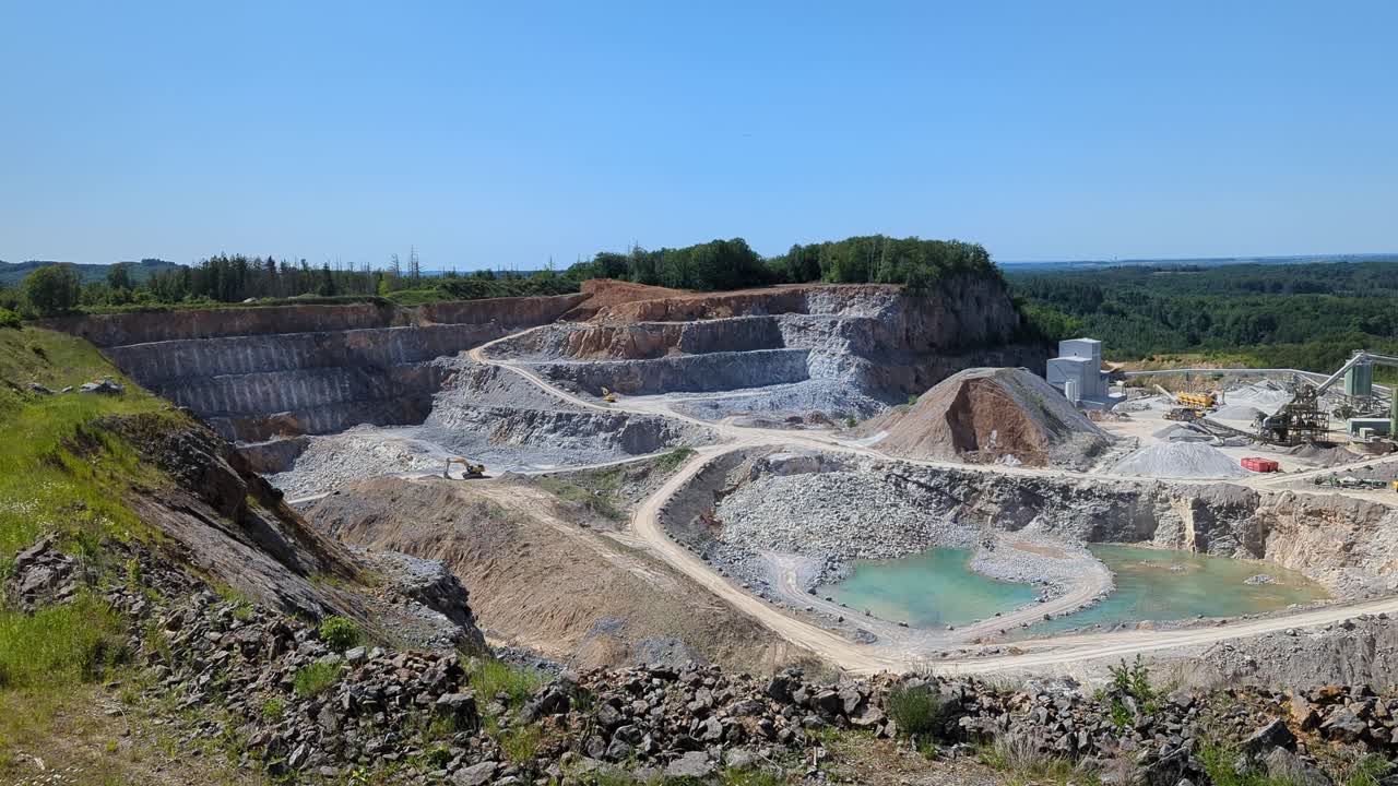 a quarry, in the photo a quarry and a blue sky in the background