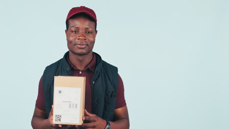 courier man, boxes and point in studio with face