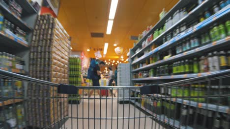 shopping cart moving in supermarket