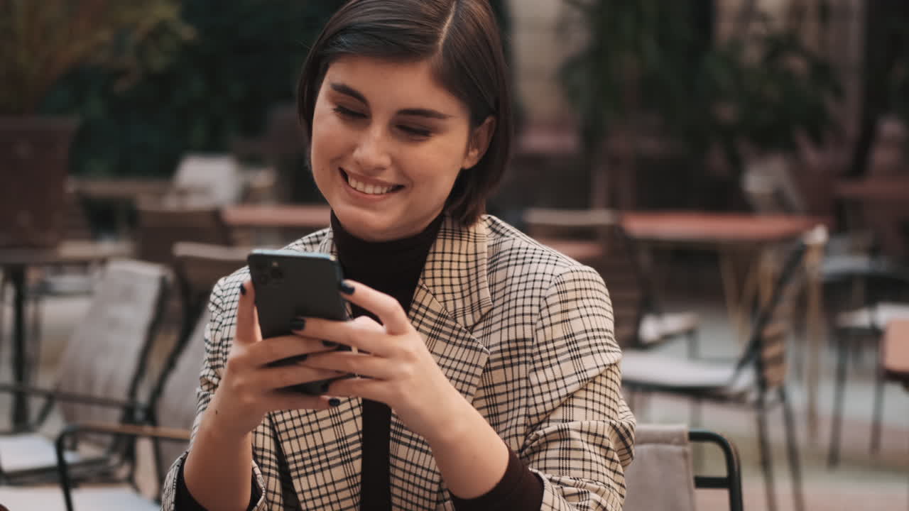 Businesswoman in a coffee break outdoor.