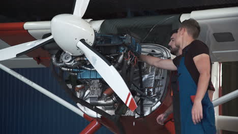 airplane engine repair in hangar