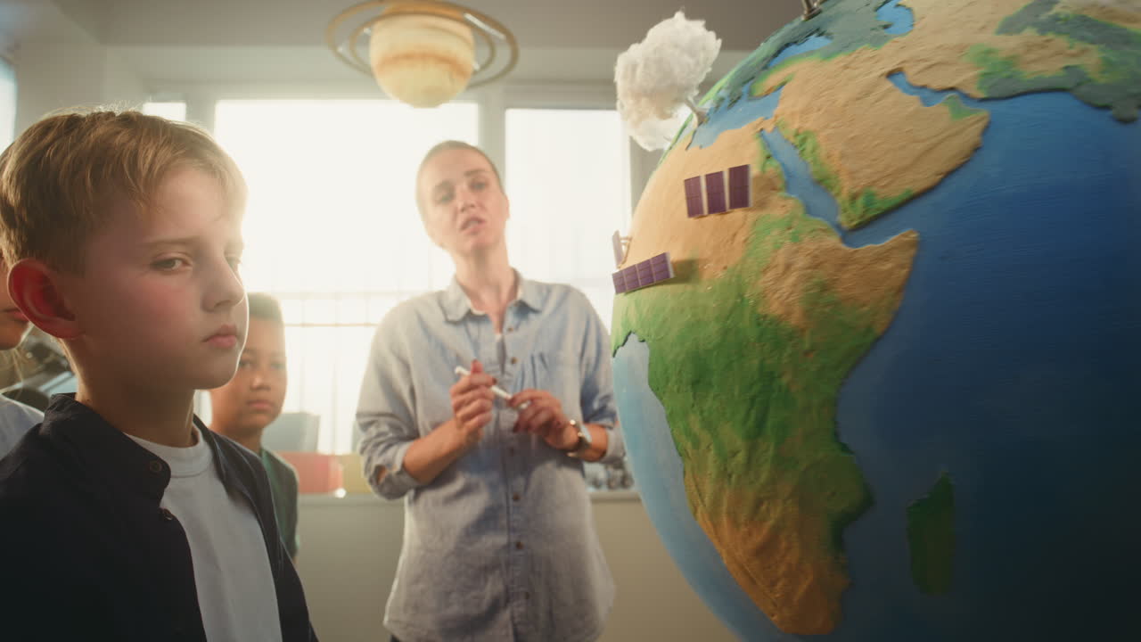 STEM Class on Renewable Energy Female Teacher Explaining Energy Resources to Elementary School