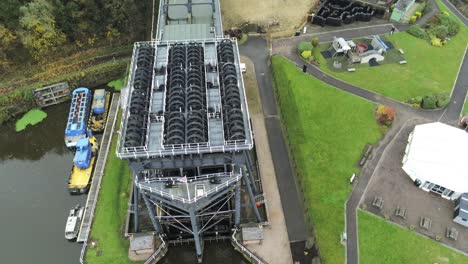 industrial victorian anderton canal boat lift aerial view river weaver rising birdseye tilt down