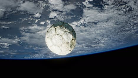 old-soccer-ball-in-space-on-Earth-orbit