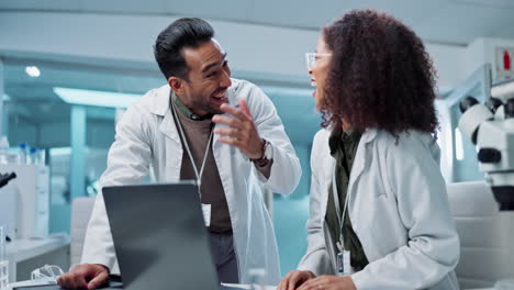scientists collaborating in a laboratory