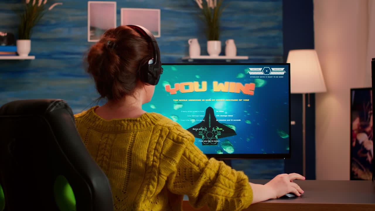 Professional gamer playing and winning in space shooter online game