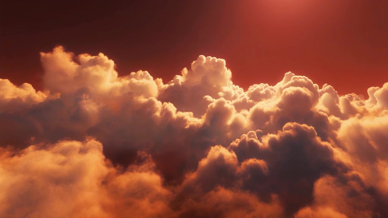 Aerial View of Golden Clouds at Sunset