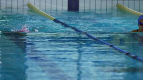 swimmers training in a swimming pool