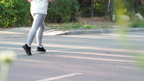 park road scene with running person